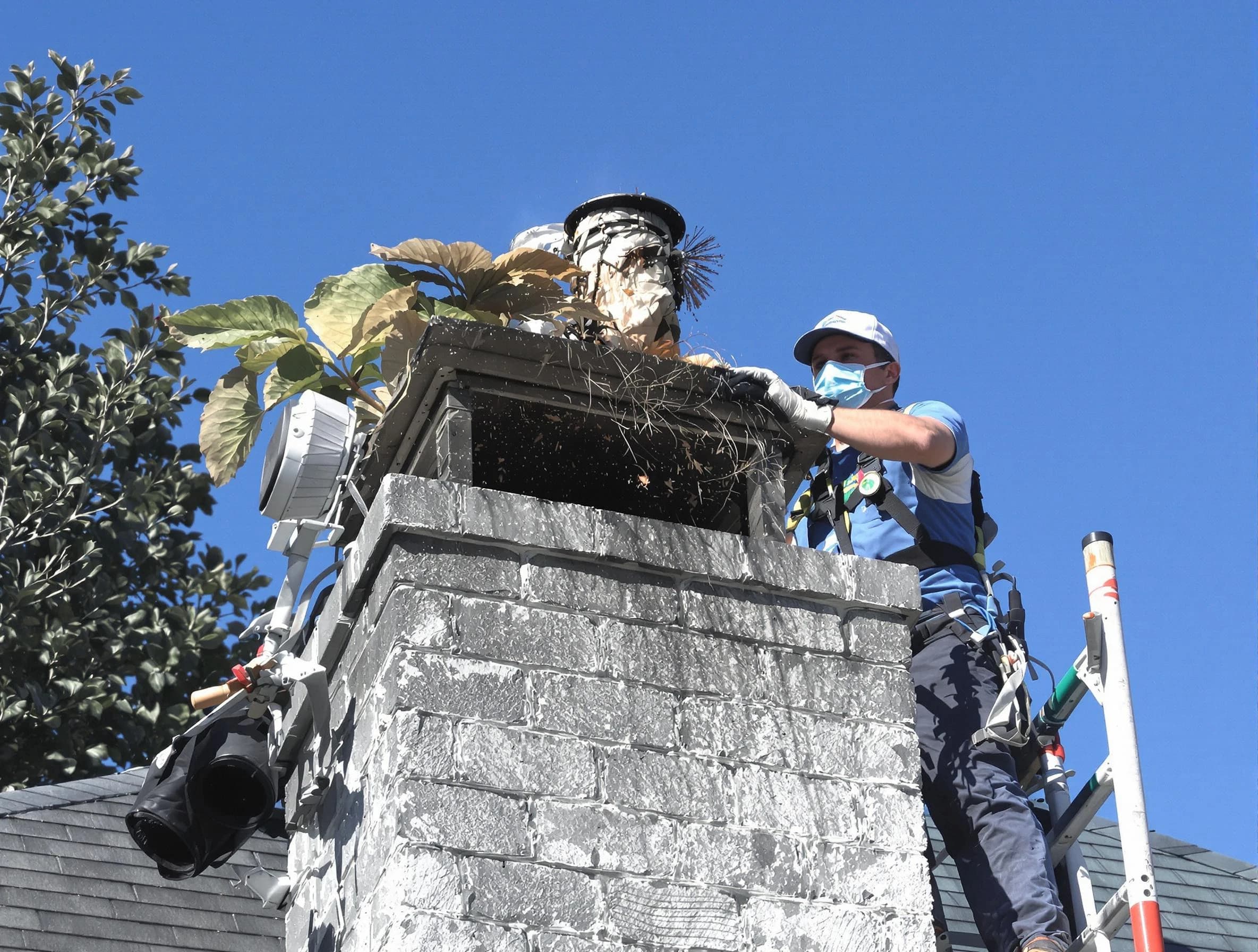 Scotch Plains Chimney Sweep specialist performing chimney cleaning in Scotch Plains, NJ